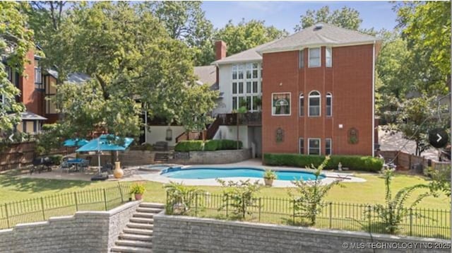 1115 Renaissance Dr, Sand Springs, OK 74063 - view of pool with a fenced backyard, a patio area, stairway, and a pool with connected hot tub