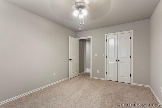 2610 E 139th St S, Jenks, OK 74008 - unfurnished bedroom with carpet flooring, a closet, and ceiling fan