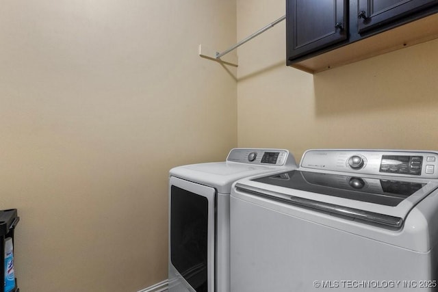 2610 E 139th St S, Jenks, OK 74008 - laundry area featuring washing machine and dryer and cabinet space