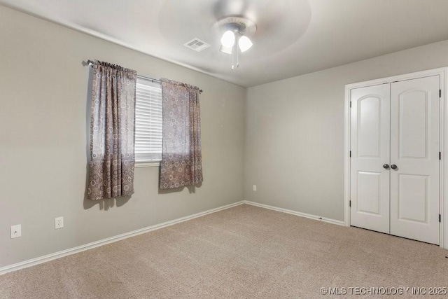 2610 E 139th St S, Jenks, OK 74008 - unfurnished bedroom featuring carpet flooring, a closet, and ceiling fan