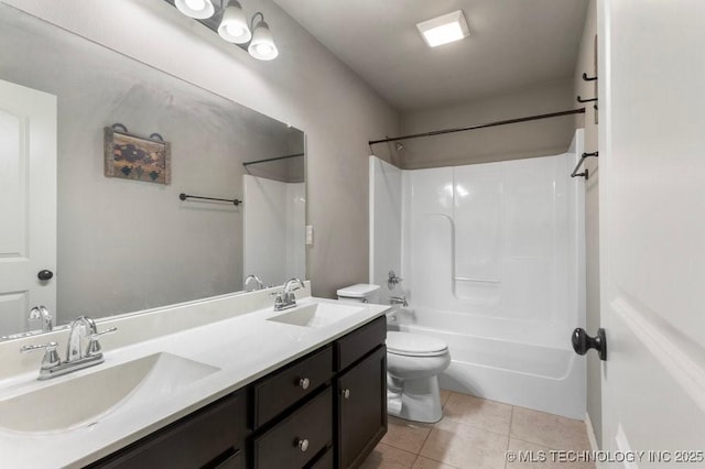 2610 E 139th St S, Jenks, OK 74008 - bathroom featuring double vanity, bathtub / shower combination, and tile patterned flooring