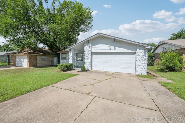 208 183rd E Ave, Tulsa, OK 74108 - mid-century inspired home featuring a front yard, stone siding, an attached garage, and driveway