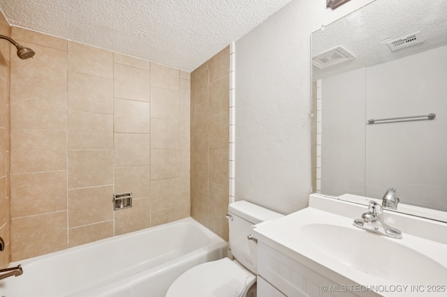 208 183rd E Ave, Tulsa, OK 74108 - bathroom with a textured ceiling, vanity, and bathing tub / shower combination