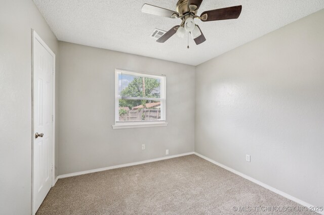 208 183rd E Ave, Tulsa, OK 74108 - carpeted empty room featuring ceiling fan and a textured ceiling