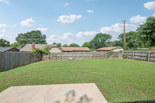 208 183rd E Ave, Tulsa, OK 74108 - fenced backyard with a patio area