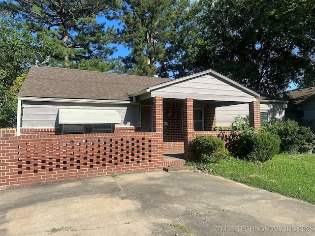 1208 S 9th, Mcalester, OK 74501 - single story home featuring brick siding and covered porch
