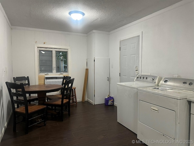 1208 S 9th, Mcalester, OK 74501 - laundry area with dark wood-type flooring, separate washer and dryer, and a textured ceiling