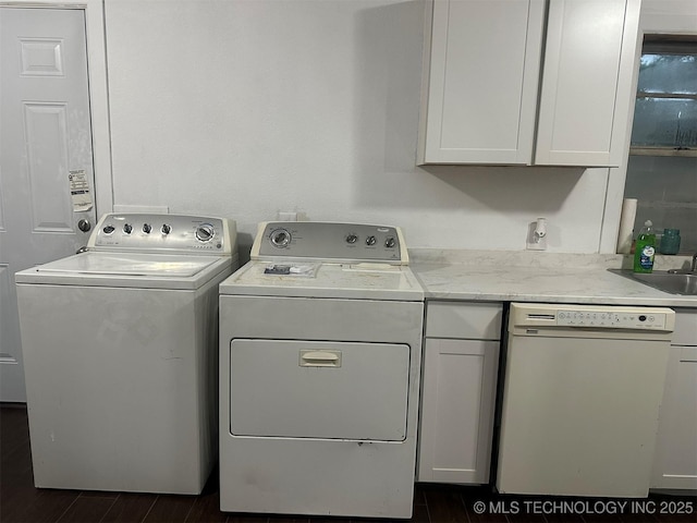 1208 S 9th, Mcalester, OK 74501 - laundry area with washing machine and clothes dryer and dark wood-style flooring