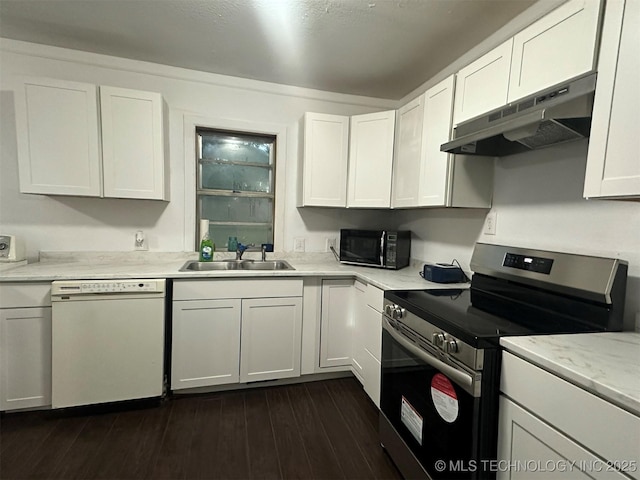 1208 S 9th, Mcalester, OK 74501 - kitchen featuring dishwasher, stainless steel electric range oven, under cabinet range hood, black microwave, and white cabinets