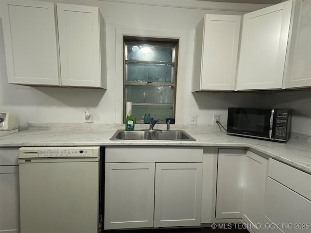 1208 S 9th, Mcalester, OK 74501 - kitchen featuring dishwasher, black microwave, and white cabinetry