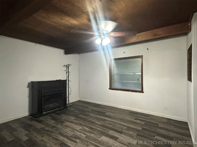 1208 S 9th, Mcalester, OK 74501 - unfurnished living room with dark wood-style floors, wooden ceiling, and a fireplace