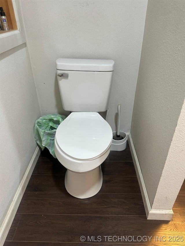 1208 S 9th, Mcalester, OK 74501 - bathroom with toilet and wood finished floors
