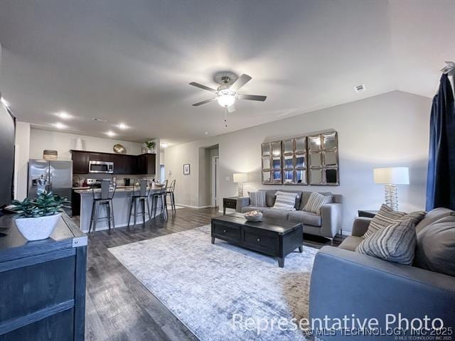 29074 E 79th Pl S, Broken Arrow, OK 74014 - living room with ceiling fan, dark wood-style floors, and vaulted ceiling