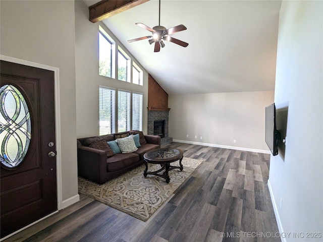 605 W 18th St S, Claremore, OK 74019 - living room featuring high vaulted ceiling, a ceiling fan, healthy amount of natural light, a brick fireplace, and dark wood-type flooring