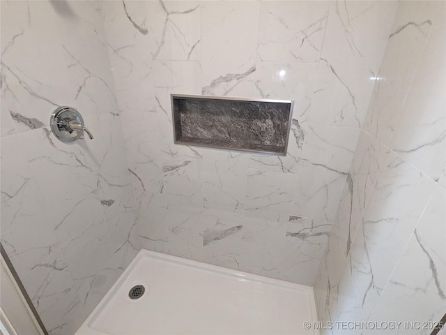 605 W 18th St S, Claremore, OK 74019 - bathroom featuring a marble finish shower