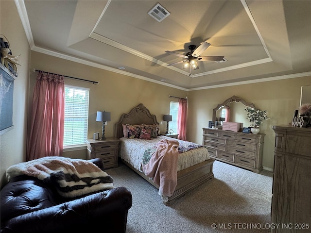 21902 W 13th St S, Sand Springs, OK 74063 - bedroom with a tray ceiling, carpet floors, a ceiling fan, and ornamental molding