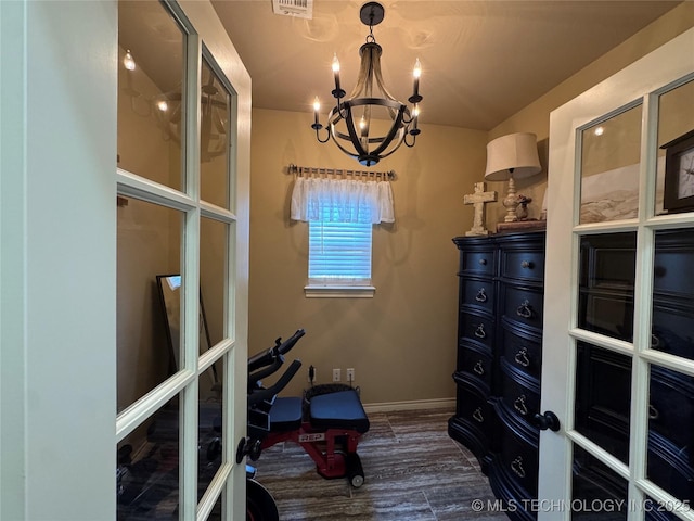 21902 W 13th St S, Sand Springs, OK 74063 - exercise area with a chandelier and baseboards