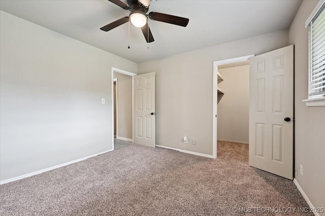3948 S 93rd E Ave, Tulsa, OK 74145 - unfurnished bedroom featuring carpet flooring, a walk in closet, ceiling fan, and a closet