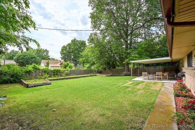 3948 S 93rd E Ave, Tulsa, OK 74145 - fenced backyard featuring a patio area and a garden