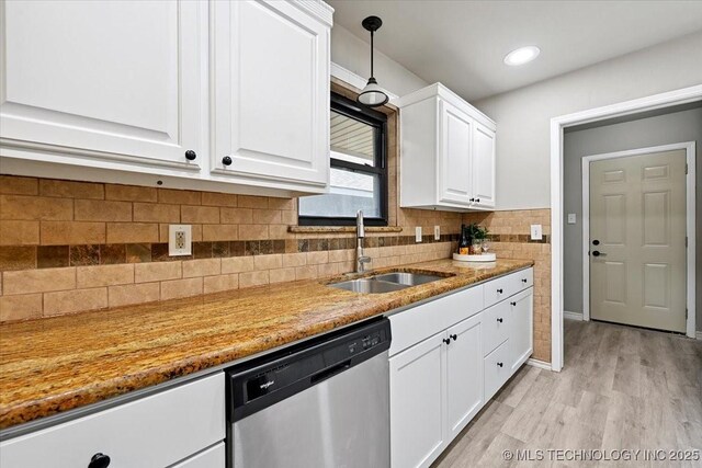 3948 S 93rd E Ave, Tulsa, OK 74145 - kitchen featuring stainless steel dishwasher, white cabinetry, light wood-type flooring, pendant lighting, and decorative backsplash