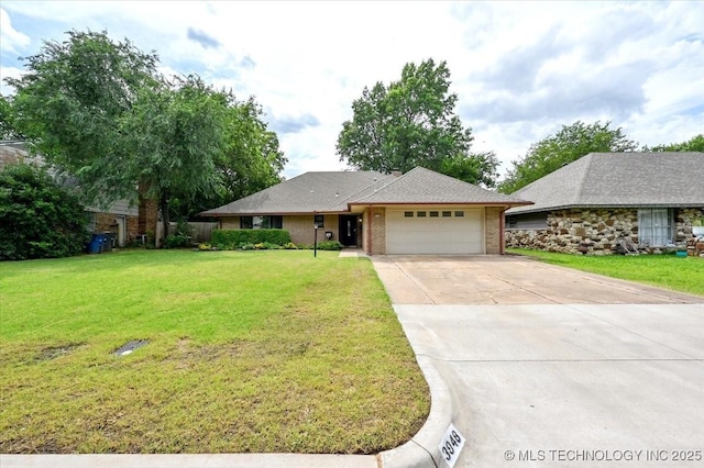 3948 S 93rd E Ave, Tulsa, OK 74145 - single story home featuring a garage, driveway, and a front lawn