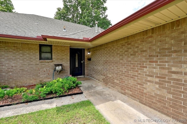 3948 S 93rd E Ave, Tulsa, OK 74145 - entrance to property with roof with shingles and brick siding