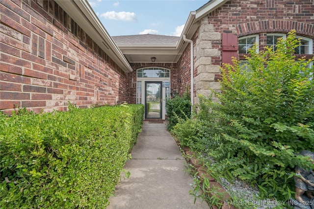7440 E Indianola St, Broken Arrow, OK 74014 - entrance to property featuring brick siding and a shingled roof