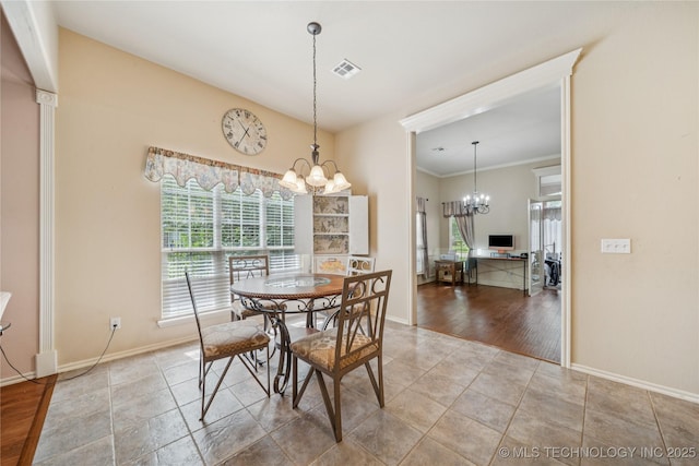 7440 E Indianola St, Broken Arrow, OK 74014 - dining room with a chandelier and crown molding