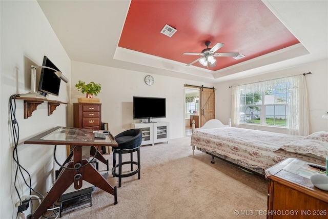 7440 E Indianola St, Broken Arrow, OK 74014 - bedroom featuring a tray ceiling, light carpet, and a barn door