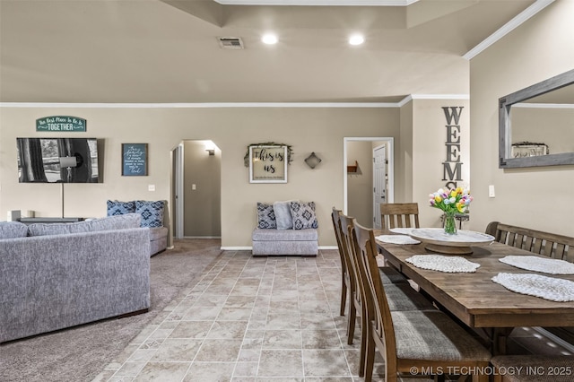 14908 E 88th St, Owasso, OK 74055 - dining space with crown molding, recessed lighting, and light colored carpet
