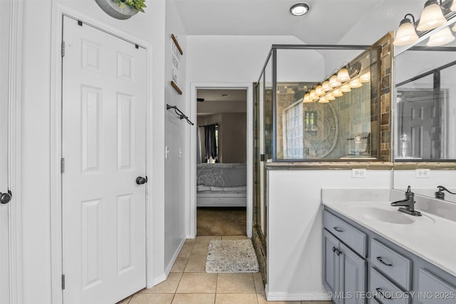 14908 E 88th St, Owasso, OK 74055 - ensuite bathroom with vanity, tile patterned floors, and a shower with door