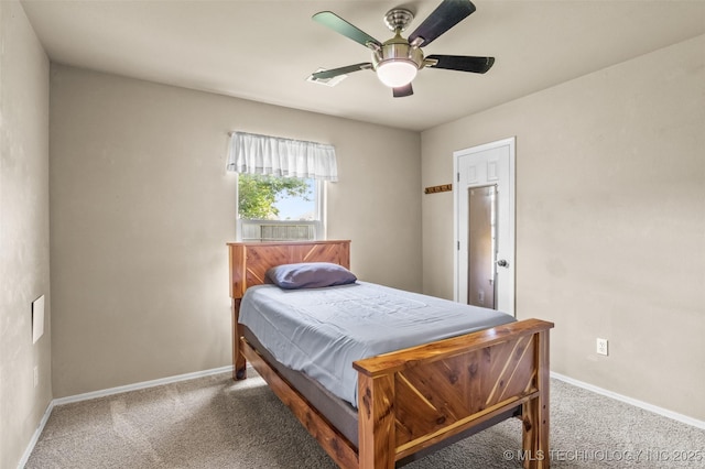 14908 E 88th St, Owasso, OK 74055 - carpeted bedroom featuring baseboards and ceiling fan