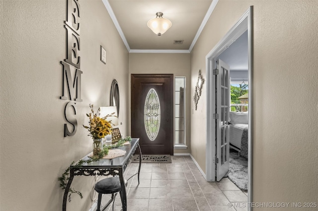 14908 E 88th St, Owasso, OK 74055 - entrance foyer featuring ornamental molding and light tile patterned flooring