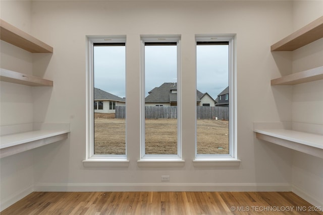 2985 E 146th St S, Bixby, OK 74008 - unfurnished dining area featuring baseboards and wood finished floors