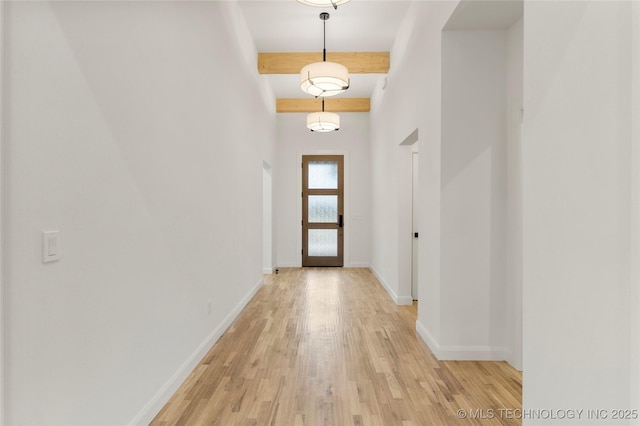 2985 E 146th St S, Bixby, OK 74008 - doorway to outside featuring beam ceiling and light wood-style flooring