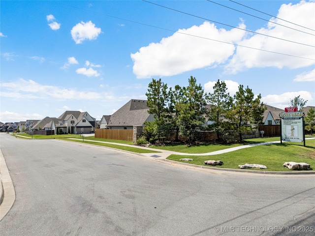 2985 E 146th St S, Bixby, OK 74008 - view of asphalt road featuring a residential view, curbs, and sidewalks