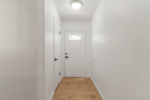 101 W Waco Pl, Broken Arrow, OK 74011 - doorway with light wood-style flooring and baseboards