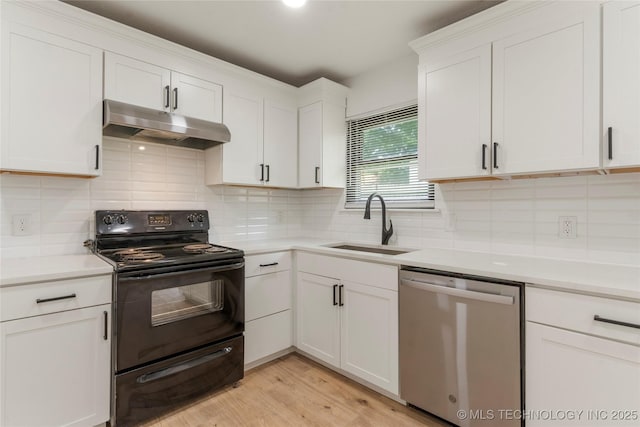 101 W Waco Pl, Broken Arrow, OK 74011 - kitchen with dishwasher, electric range, under cabinet range hood, white cabinets, and light countertops