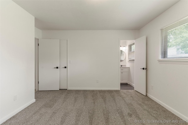 101 W Waco Pl, Broken Arrow, OK 74011 - unfurnished bedroom featuring carpet and connected bathroom