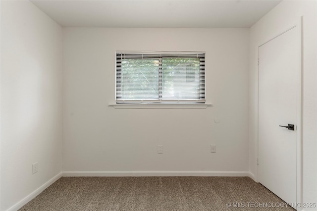 101 W Waco Pl, Broken Arrow, OK 74011 - carpeted spare room featuring baseboards