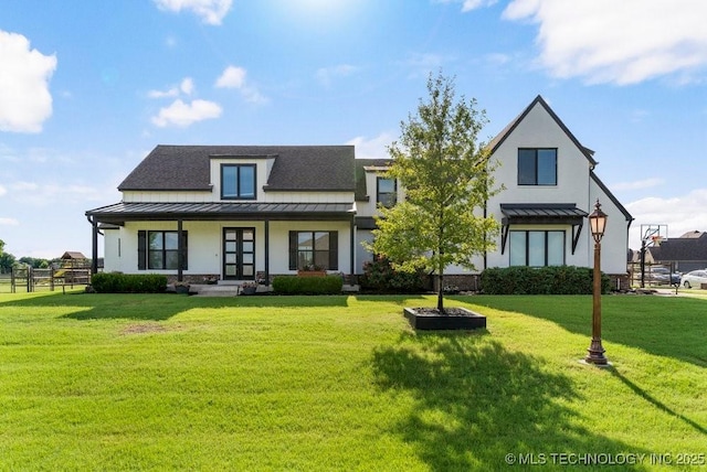 19021 E Chokeberry St, Owasso, OK 74055 - back of house featuring a standing seam roof, a porch, a metal roof, and stucco siding