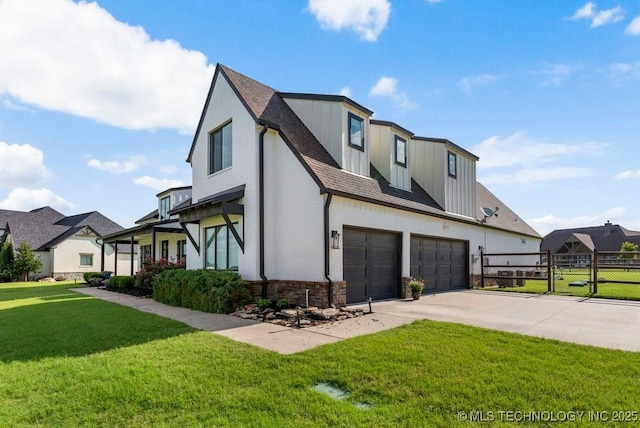 19021 E Chokeberry St, Owasso, OK 74055 - view of front of property featuring concrete driveway, brick siding, an attached garage, a shingled roof, and board and batten siding