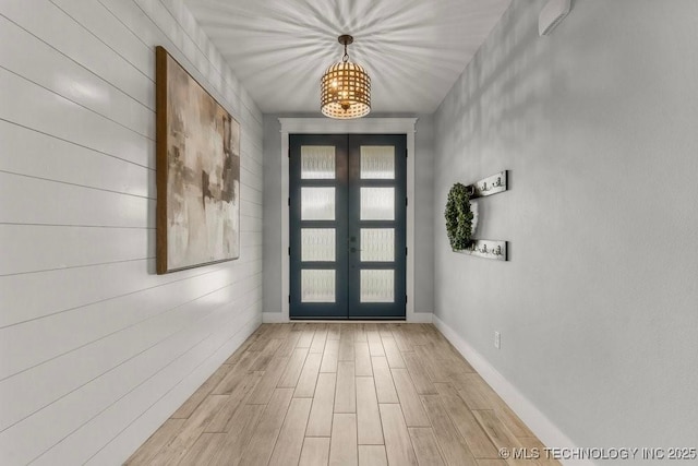 19021 E Chokeberry St, Owasso, OK 74055 - doorway to outside with french doors, a chandelier, and wood finished floors