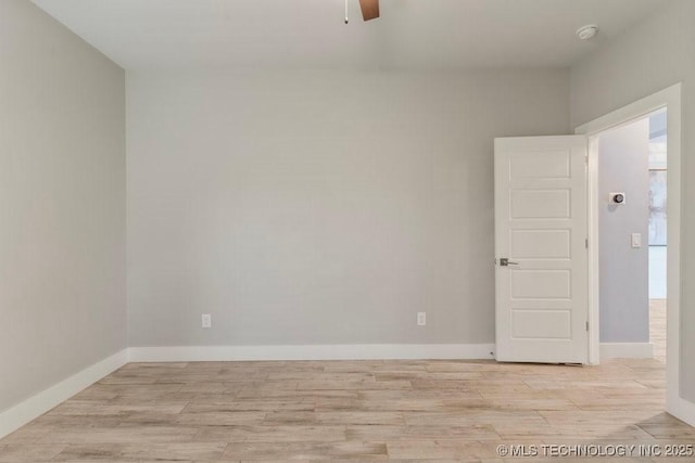 19021 E Chokeberry St, Owasso, OK 74055 - empty room with light wood-style flooring, ceiling fan, and a smoke detector