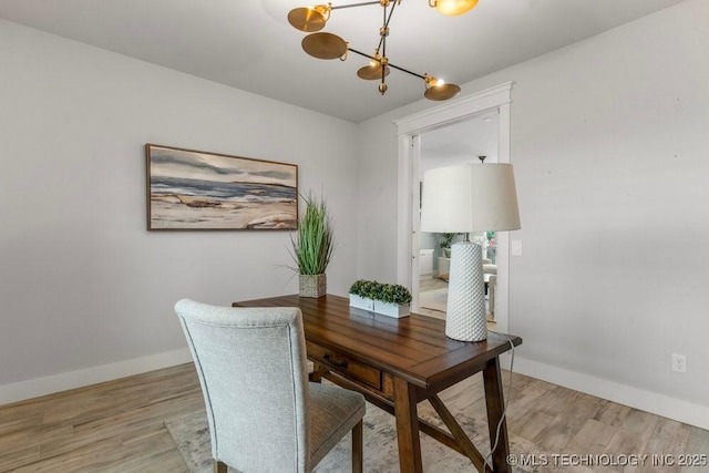 19021 E Chokeberry St, Owasso, OK 74055 - office area featuring a chandelier and light wood-style floors