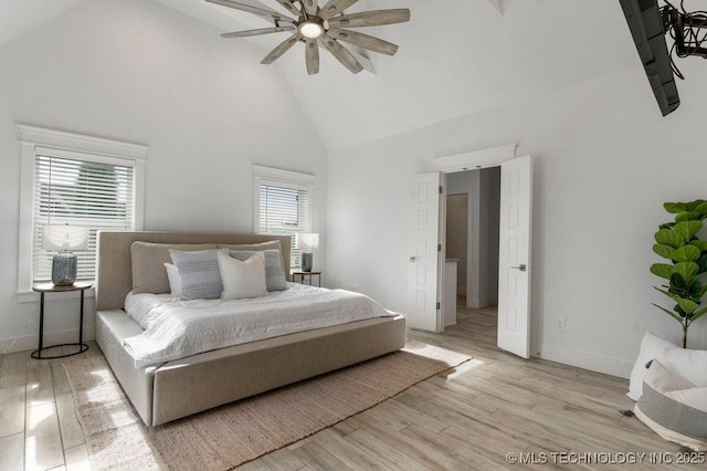19021 E Chokeberry St, Owasso, OK 74055 - bedroom featuring high vaulted ceiling, light wood finished floors, and ceiling fan