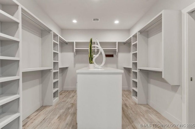 19021 E Chokeberry St, Owasso, OK 74055 - walk in closet with light wood-style flooring