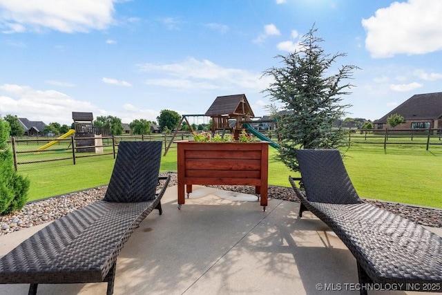19021 E Chokeberry St, Owasso, OK 74055 - fenced backyard with a playground and a patio