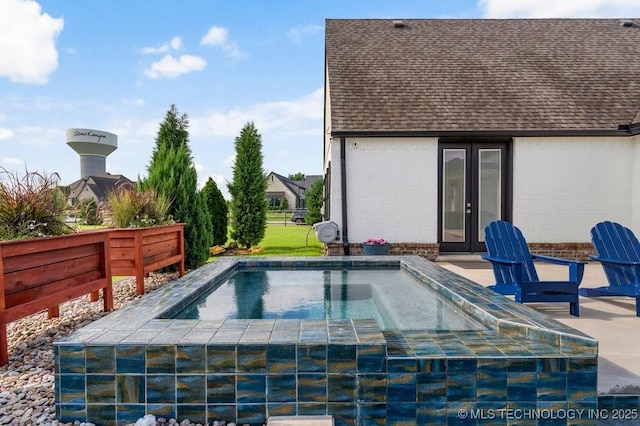 19021 E Chokeberry St, Owasso, OK 74055 - view of pool featuring an in-ground hot tub and french doors