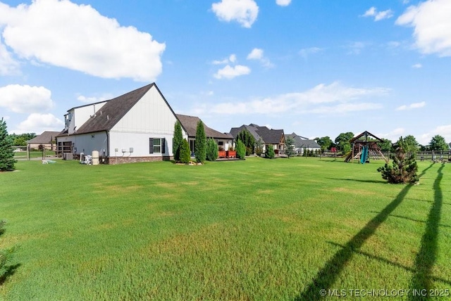 19021 E Chokeberry St, Owasso, OK 74055 - view of yard featuring a playground